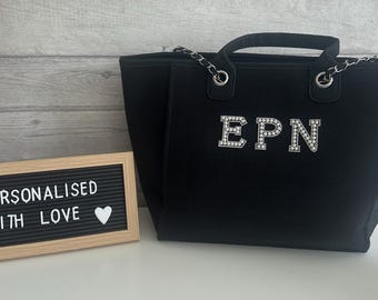 Black initial tote bag
