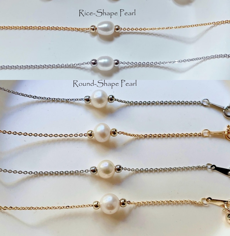 May include: Four delicate necklaces with pearl accents. Two necklaces feature round pearls and two feature rice-shaped pearls. Each necklace has a gold or silver chain.