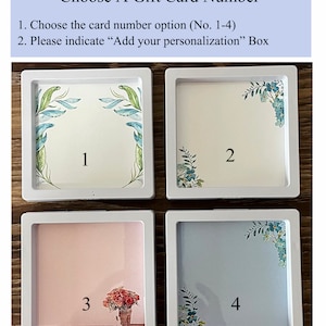 May include: Four white square frames with different floral designs and numbers 1 through 4. Choose a gift card number option (No. 1-4). Please indicate "Add your personalization" Box.