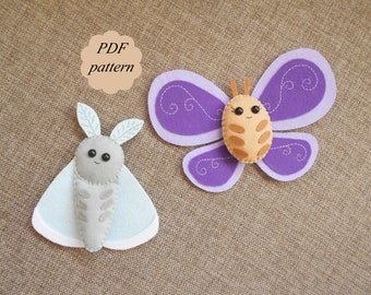 May include: Two felt animal patterns, a purple butterfly and a light blue moth, with embroidered details and black eyes. The text "PDF pattern" is on a peach-coloured circle.