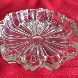 Clear glass vintage ashtray round