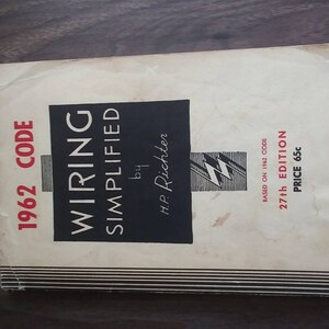 May include: A vintage book titled "Wiring Simplified" by H.P. Richter, based on the 1962 code. The book is the 27th edition and costs 65 cents.
