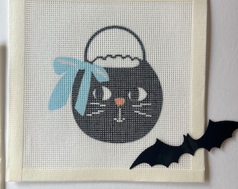 Toile noire avec motif chat et noeud