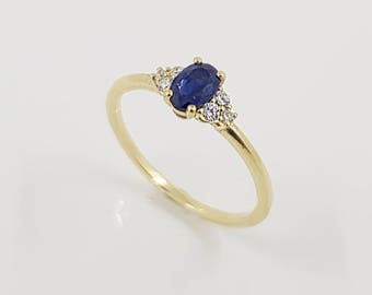 Oval Cut Blue Sapphire and Diamond Engagement Ring