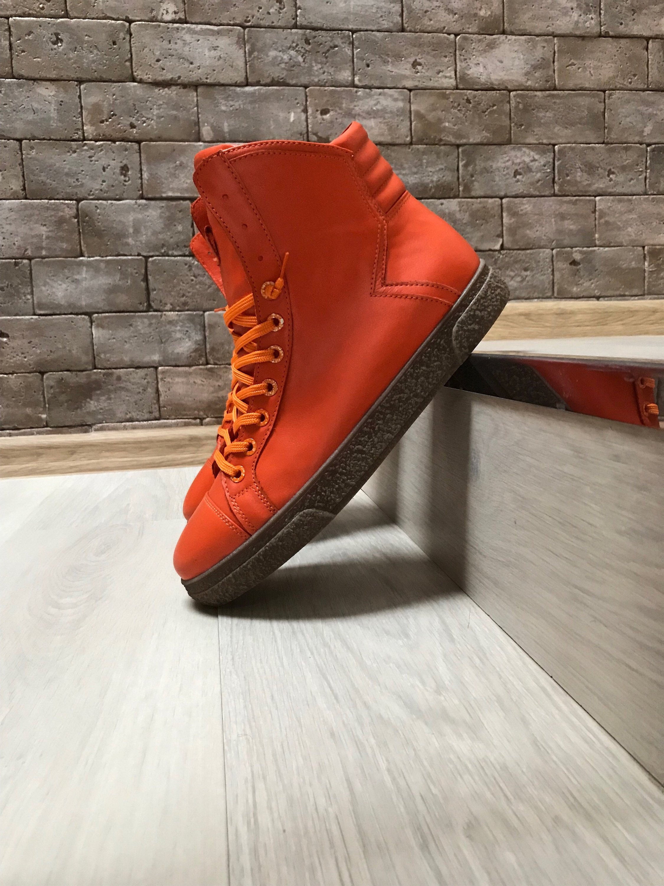 long orange boots