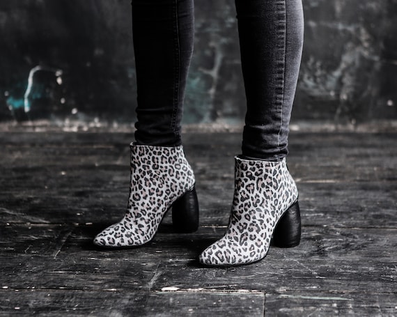 women size 6 Leopard print suede boots 