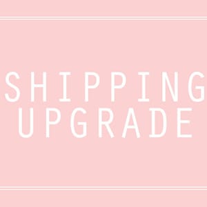 May include: A pink background with a white border and the text "SHIPPING UPGRADE" in white.