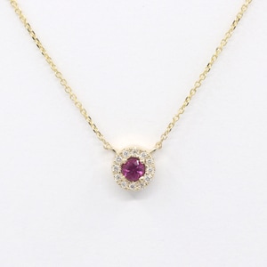 May include: A gold chain necklace with a pendant featuring a round pink gemstone surrounded by a halo of smaller white gemstones.