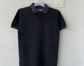 Polo vintage FRED PERRY con logo pequeño. Talla XS