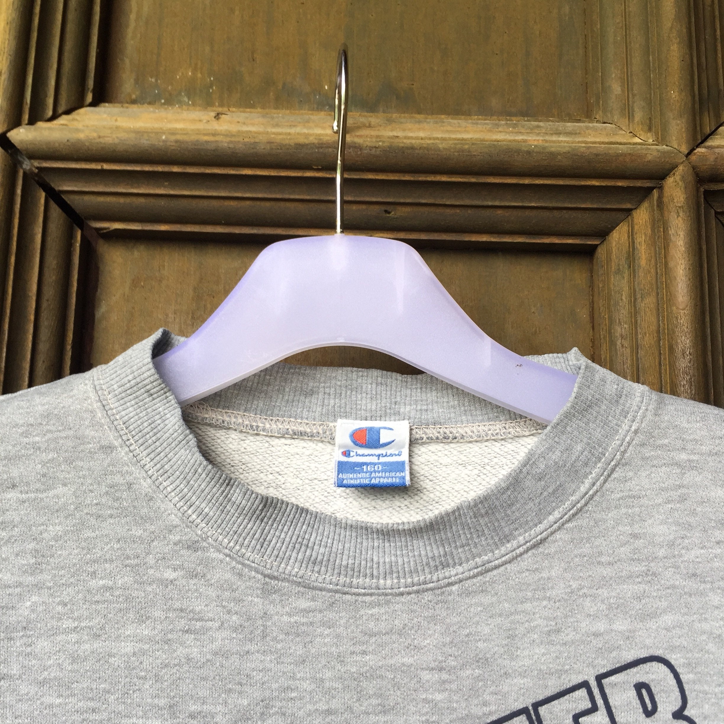 Champion sweater cost qi sale