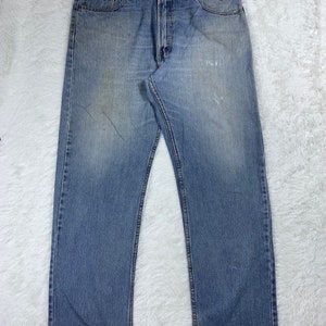 Vintage Levis 505 Light Wash Faded Blue Jeans.. size 40