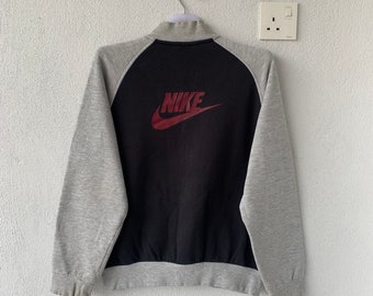 vintage NIKE varsity jacket spell out big logo.. swoosh logo. Vintage jacket.. size S