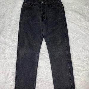 Vintage Levis 505 Faded Black Jeans.. size 34