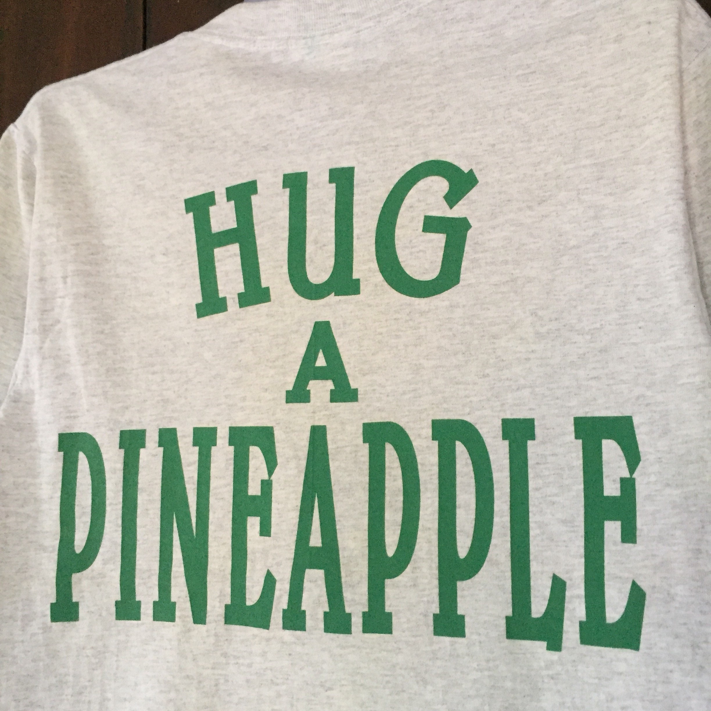 Hug a pineapple shirt hotsell