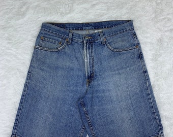 Vintage Levis 550 vervaagde blauwe jeans.. Korte broek.. maat 34