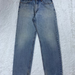 Vaqueros Levi&#39;s 550 vintage de color azul claro y desgastado, talla 32