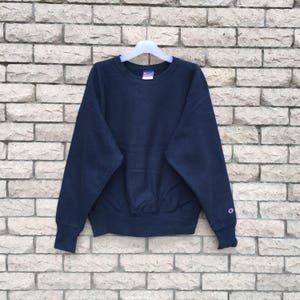 Sudadera vintage!!! Sudadera CHAMPION con pequeño logo bordado...color liso....sudadera vintage...talla M.