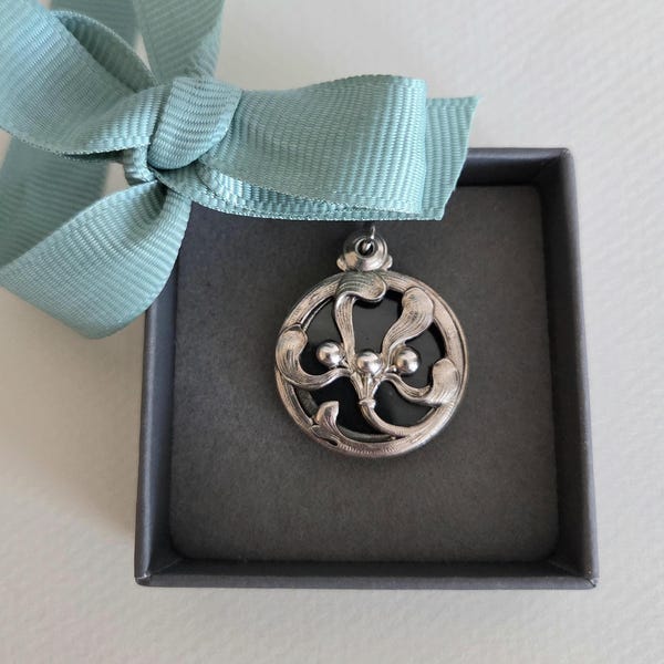 Art Nouveau silver mistletoe design sliding locket pendant