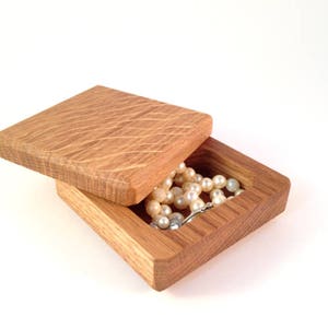 Handmade, massive wooden box with turning lid