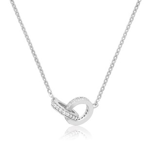 May include: A silver necklace with a pendant of two intertwined circles, each set with small, sparkling stones. The fine chain supports the pendant, creating a simple, elegant design. The necklace is shown against a white backdrop.