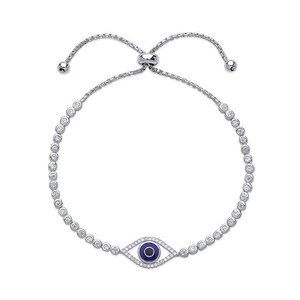 May include: Silver bracelet with a blue evil eye charm and clear cubic zirconia stones.