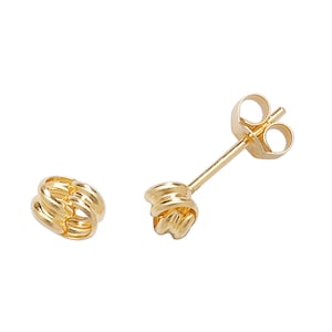May include: A pair of gold knot-shaped stud earrings. The earrings are simple and elegant, and would make a great gift for any occasion.