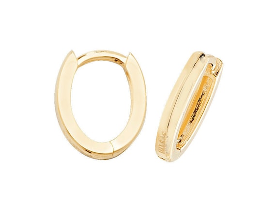 9ct oval shaped huggie earrings. 9ct oval shaped huggie earrings.