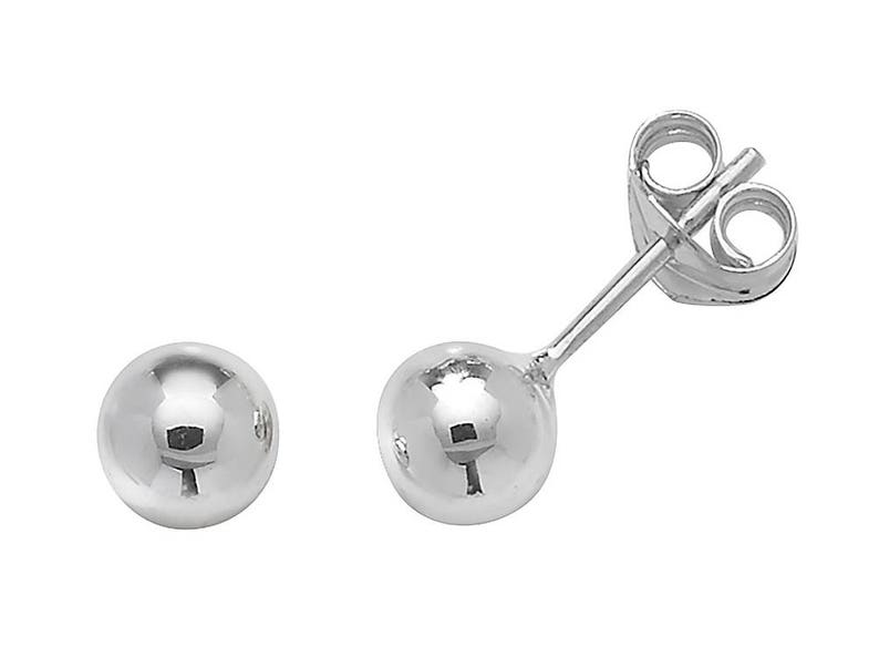 May include: A pair of silver ball stud earrings.