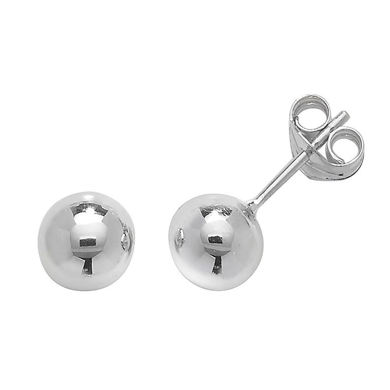 May include: A pair of silver ball stud earrings. The earrings are simple and classic, and they would make a great gift for any occasion.