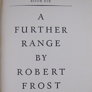 May include: Open book page with the title "A Further Range" by Robert Frost. The text is in a classic serif font, with "Book Six" at the top and the publisher's name, Henry Holt and Company, at the bottom. The book is on a neutral background.