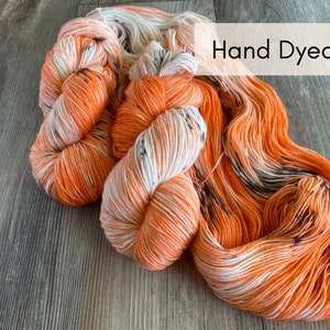 HAND DYED YARN, Little Jack, Fingering Weight, Superwash Merino Wool, Sock Yarn, orang white and black speckled yarn, koi fish yarn image 1