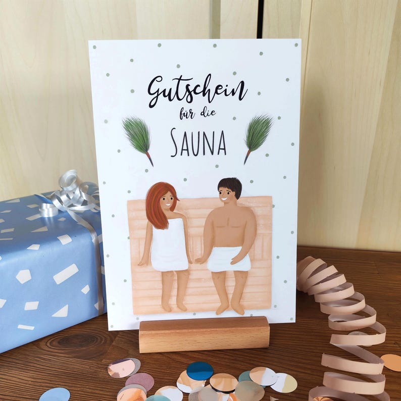 May include: A white rectangular greeting card with a light grey polka dot pattern, featuring the text Gutschein f&uuml;r die SAUNA, two green pine sprigs, and an illustration of two people wrapped in white towels sitting on a wooden sauna bench.