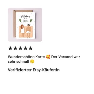 May include: A white greeting card with a brown envelope featuring an illustration of two people wrapped in white towels sitting on a wooden bench. The text reads Gutschein f&uuml;r die SAUNA, accompanied by two green leaf icons and small grey dots.