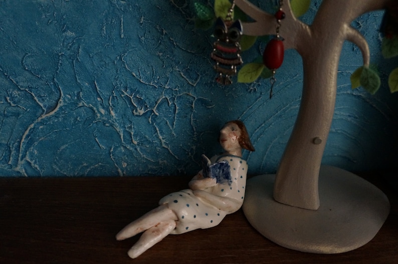 Small ceramic sculpture 13cm length Vintage style Sweet lady reading a book in the summer