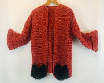 Orange fluffy mohair cardigan sweater with pockets