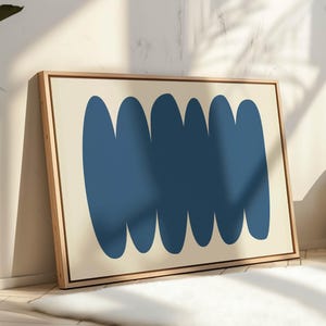 May include: Abstract art print with a cream background and five blue rounded shapes in a horizontal row.