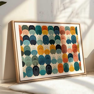 May include: A framed rectangular wall art print featuring a repeating pattern of stacked, rounded arch shapes in a palette of mustard yellow, teal, navy blue, coral, and sage green on a cream background, enclosed in a light wood frame.