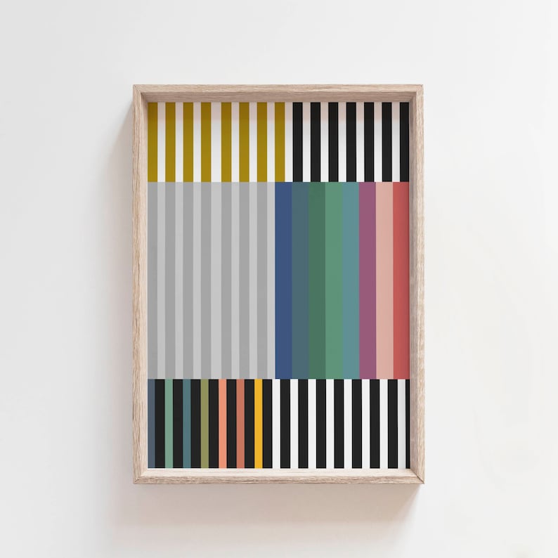 Pode incluir: Uma impress&atilde;o de arte abstrata emoldurada com um padr&atilde;o geom&eacute;trico de listras verticais em v&aacute;rias cores, incluindo amarelo, cinza, azul, verde, rosa e preto.