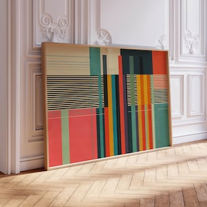 Può includere: Una stampa artistica astratta incorniciata con un design geometrico. L'opera d'arte presenta linee verticali e orizzontali, strisce e blocchi di colore nelle tonalità di rosso, verde, giallo e nero. La cornice è in legno chiaro.
