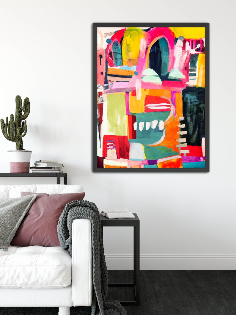 May include: Abstract painting with bold, colorful shapes and lines in shades of pink, yellow, orange, green, blue, and black. The painting is framed in a black frame.
