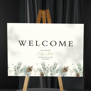 Cartello di benvenuto per matrimonio con pigna invernale – Cartello per matrimonio festivo – Cartello con vegetazione boschiva