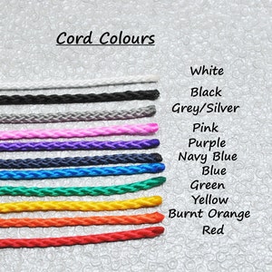 May include: A range of cord colours, including white, black, grey/silver, pink, purple, navy blue, blue, green, yellow, burnt orange, and red.