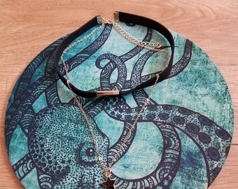 black choker w/ gold chain & black star charm