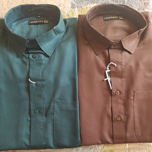 May include: Two long-sleeved shirts, one green and one brown, with a white label that says "L.ELEGANT" on each.