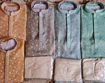 May include: Four traditional Indian men's shirts with floral patterns in gold, gray, light blue, and green. Each shirt is folded and packaged with a white undershirt.