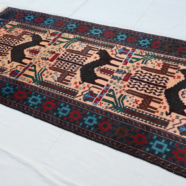 Auth: Multiple color Afghan handmade Baluch rug, from the tent collection.. .3.4 x 6.9 Feet.