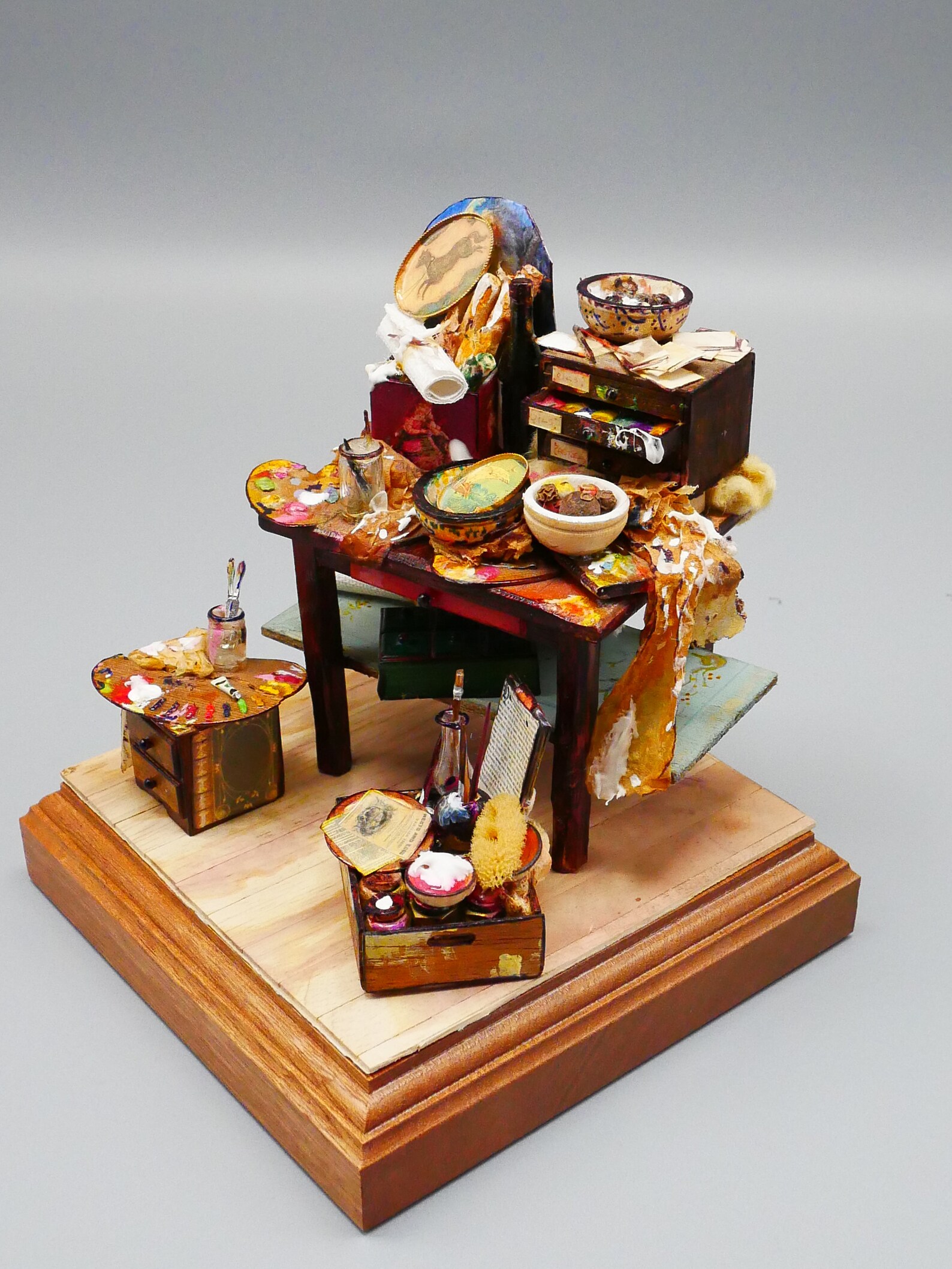A 12th scale collection of miniature artists paints and Etsy