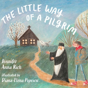 May include: An illustrated book cover with the title "The Little Way of a Pilgrim" in white text on a blue background. The cover features a small wooden church with a cross on top, a path leading away from the church, and two figures walking along the path. The text "Jennifer Anna Rich" is written below the title, and the text "illustrated by Diana-Elena Popescu" is written below that.
