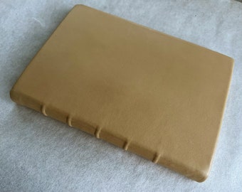 casebound goat leather prayer book with letterpress printed handmade paper pages