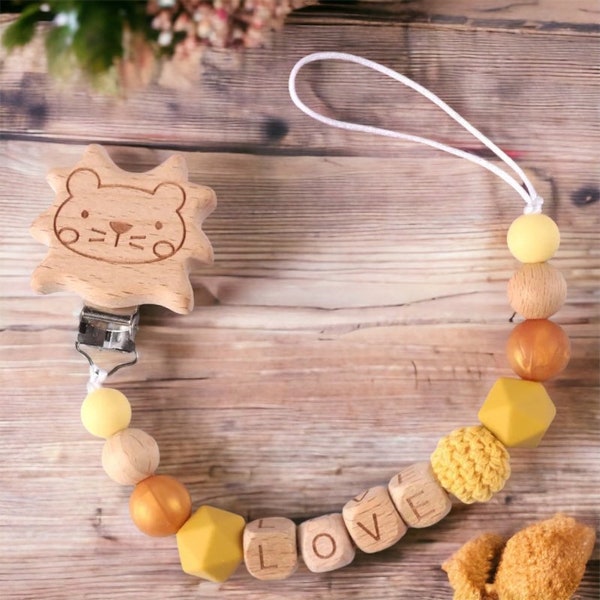 Pacifier chain with the name lion